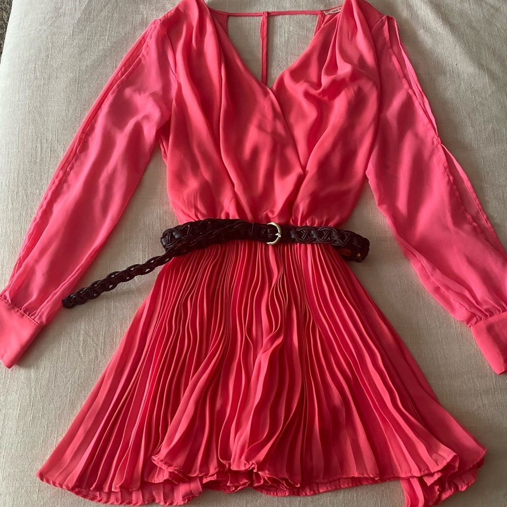 Casual cocktail dress with belt.